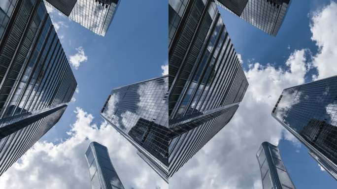 T/L PAN高层企业建筑摩天大楼和天空的低角度视图