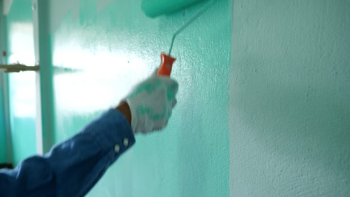 粉刷墙壁粉刷墙粉刷匠绿色粉刷