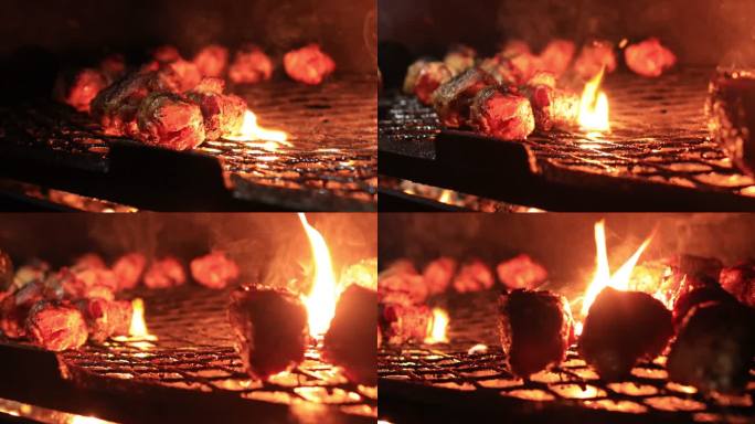 烧烤概念烤肉铁网火焰燃烧大块牛排