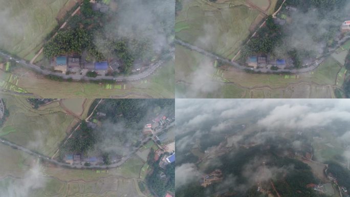 群山云雾缭绕幸福新农村4K航拍视频素材