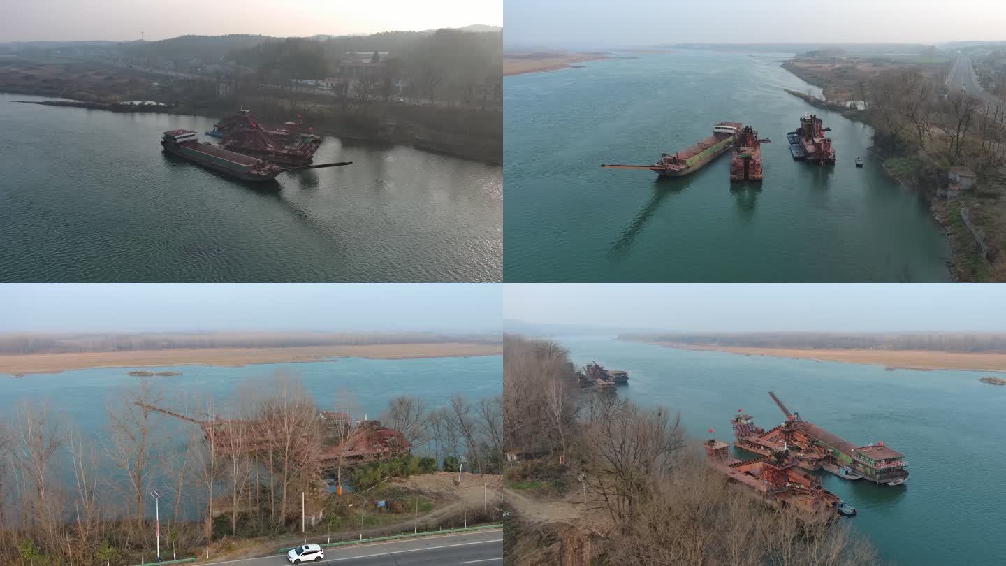 湖北襄阳谷城汉江江面的采砂船环绕