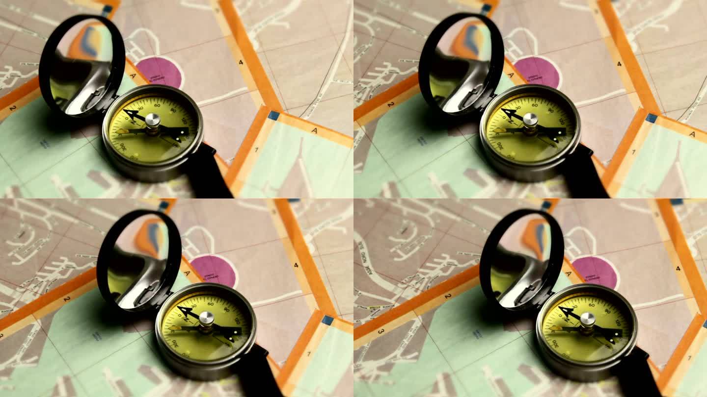 指南针指示意大利城市地图上的正确路径