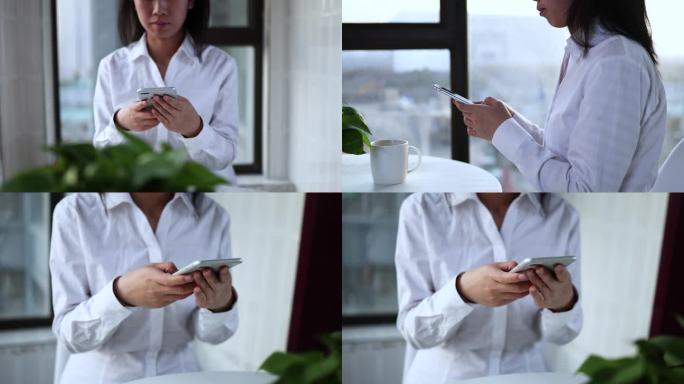 女白领使用智能手机