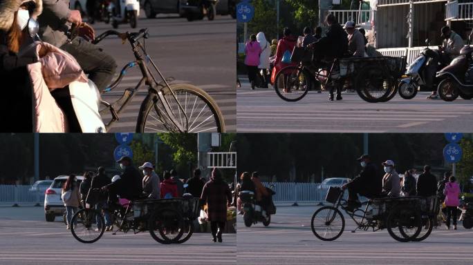 城镇道路上蹬三轮单车的老百姓