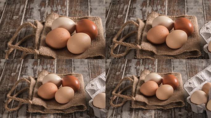 乡村木桌上的鸡蛋4个鸭蛋早餐厨房食物营养