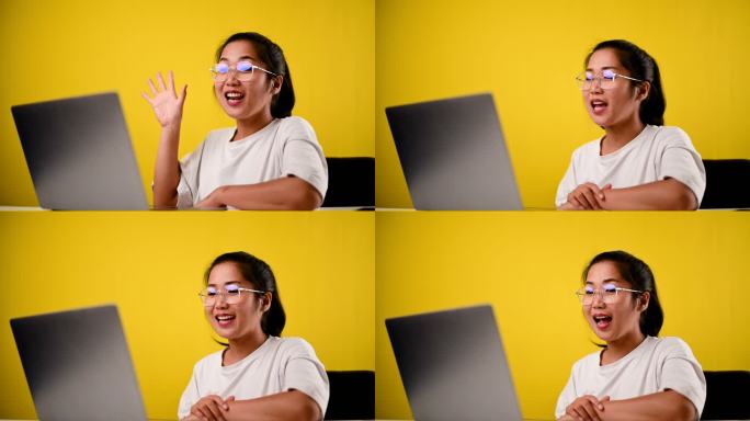 快乐的亚洲女孩在线电话博客申请者教师坐在家里办公室摄像头查看视频通话期间的在线工作面试记录电话会议、