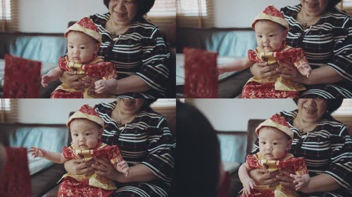 中国男婴（2-5个月）在家庆祝中国新年