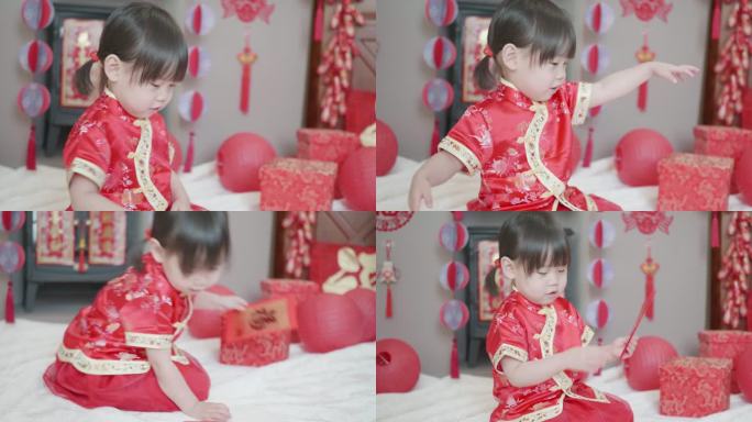 中国蹒跚学步的女孩在家庆祝中国新年