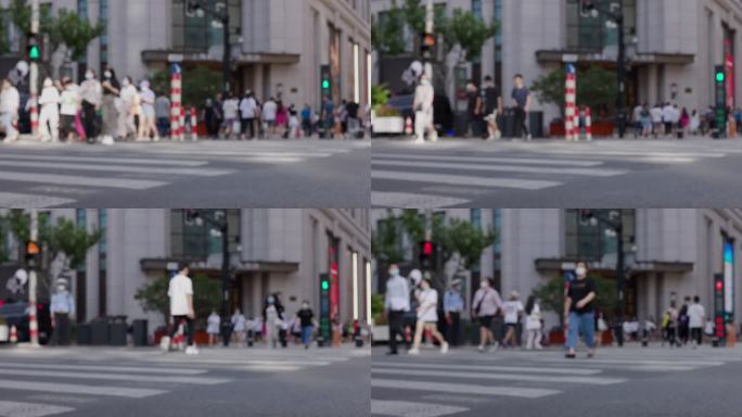 在人行横道上行走的人。中国上海城市景观