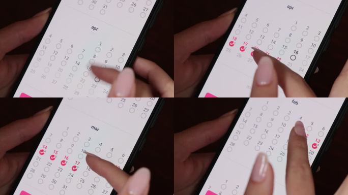 使用智能手机日历应用程序特写女性的手