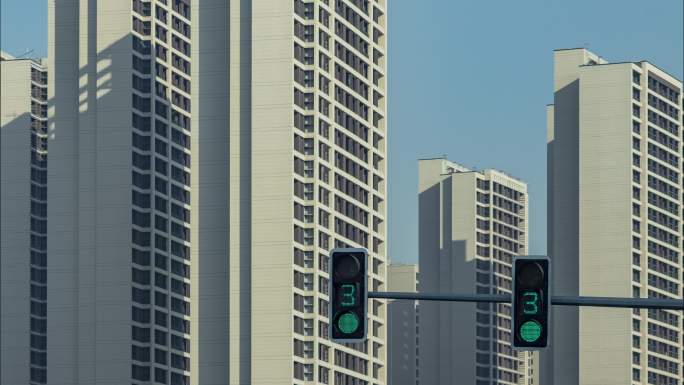 新楼房光影流动和红绿灯交通信号灯