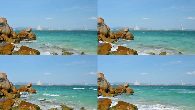 海南三亚蜈支洲岛码头航拍浪花拍打礁石风景