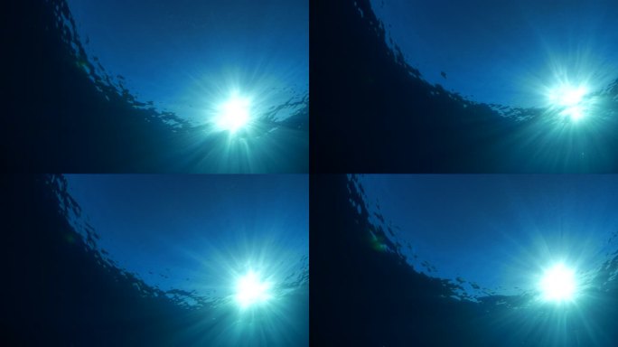 海水表面的阳光水下拍摄太阳海底世界水面波
