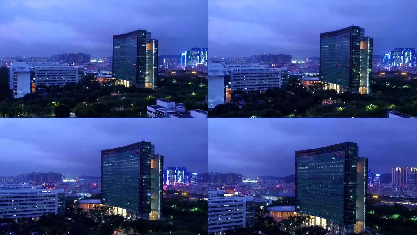 航拍深圳华为总部行政大楼 侧推 夜景