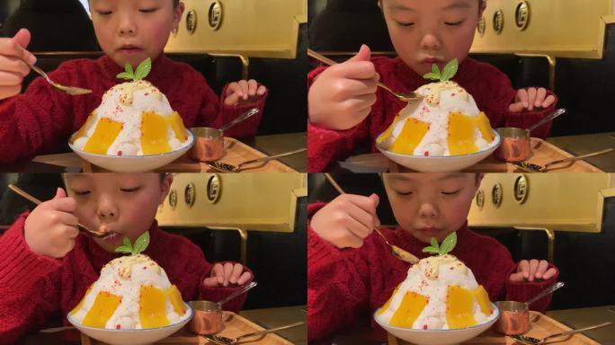 人像与甜品：小男孩正在吃芒果沙冰