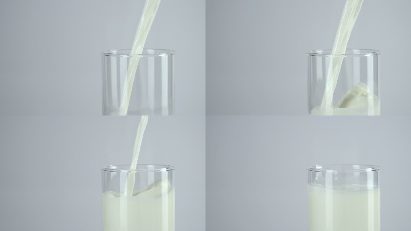 慢镜头：将牛奶倒入白色背景的玻璃杯中。
