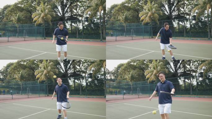 亚洲中国羽绒综合症男子网球运动员周末上午在网球场练习