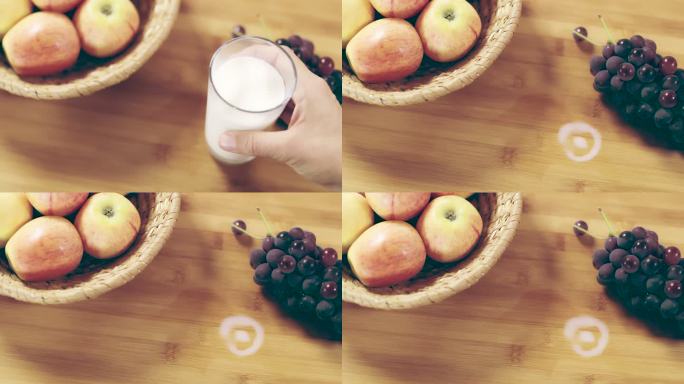 DS将牛奶倒入桌子上的玻璃杯