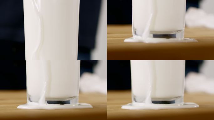 SLO MO将牛奶洒在桌子上