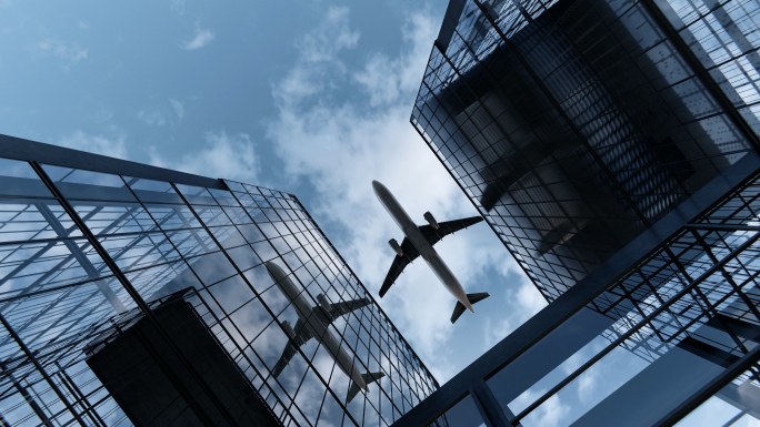 商务飞机起飞金融写字楼飞过商业建筑空间
