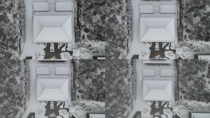 航拍俯瞰雪后的威海里口山广福寺大殿