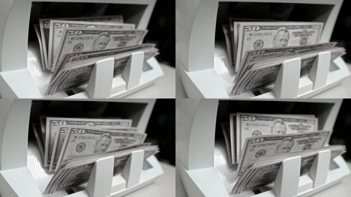 SLO MO LD 50美元钞票通过货币柜台