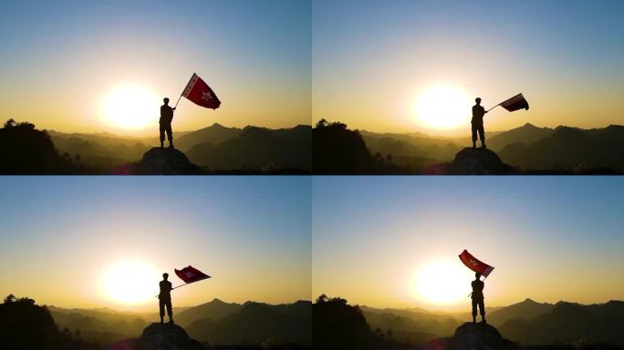 山顶挥舞旗帜工农红军军旗爱国教育红色革命