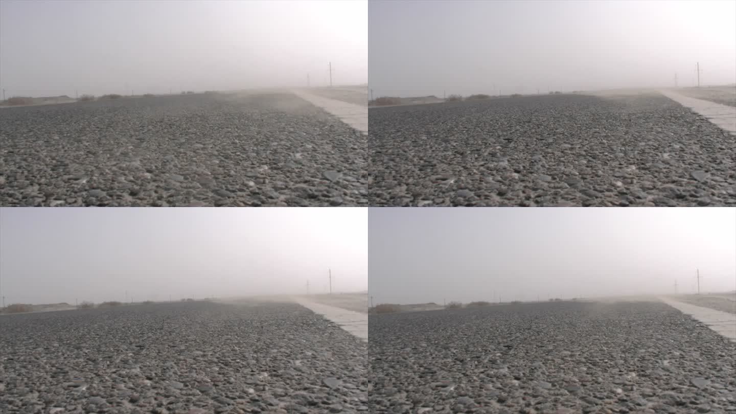 新疆 沙尘天气 砾石子路面风沙