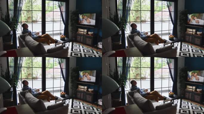 老人在家看电视家庭录像沙发上看电视