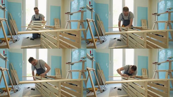 高加索男性木匠在厨房组装木架子