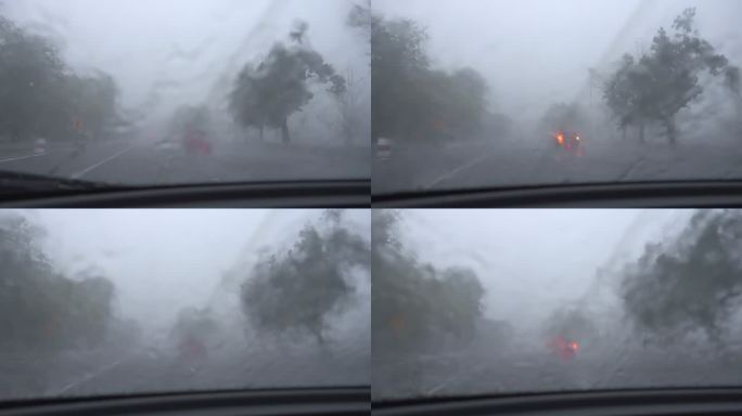 汽车前视镜上的大雨缓慢移动