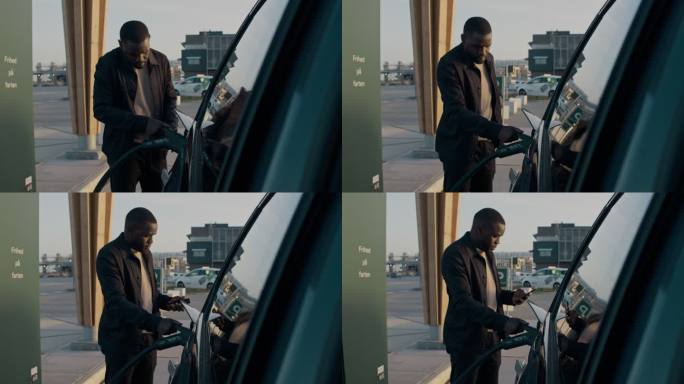 一个英俊的年轻人在车库给电动车充电时查看信息的4k视频片段