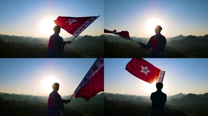 山顶挥舞旗帜庆祝胜利会师爱国教育红色革命