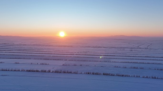 航拍内蒙古雪域雪原日落