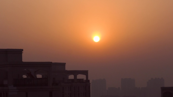 雾霾城市天气日出早晨空气污染指数太阳升起