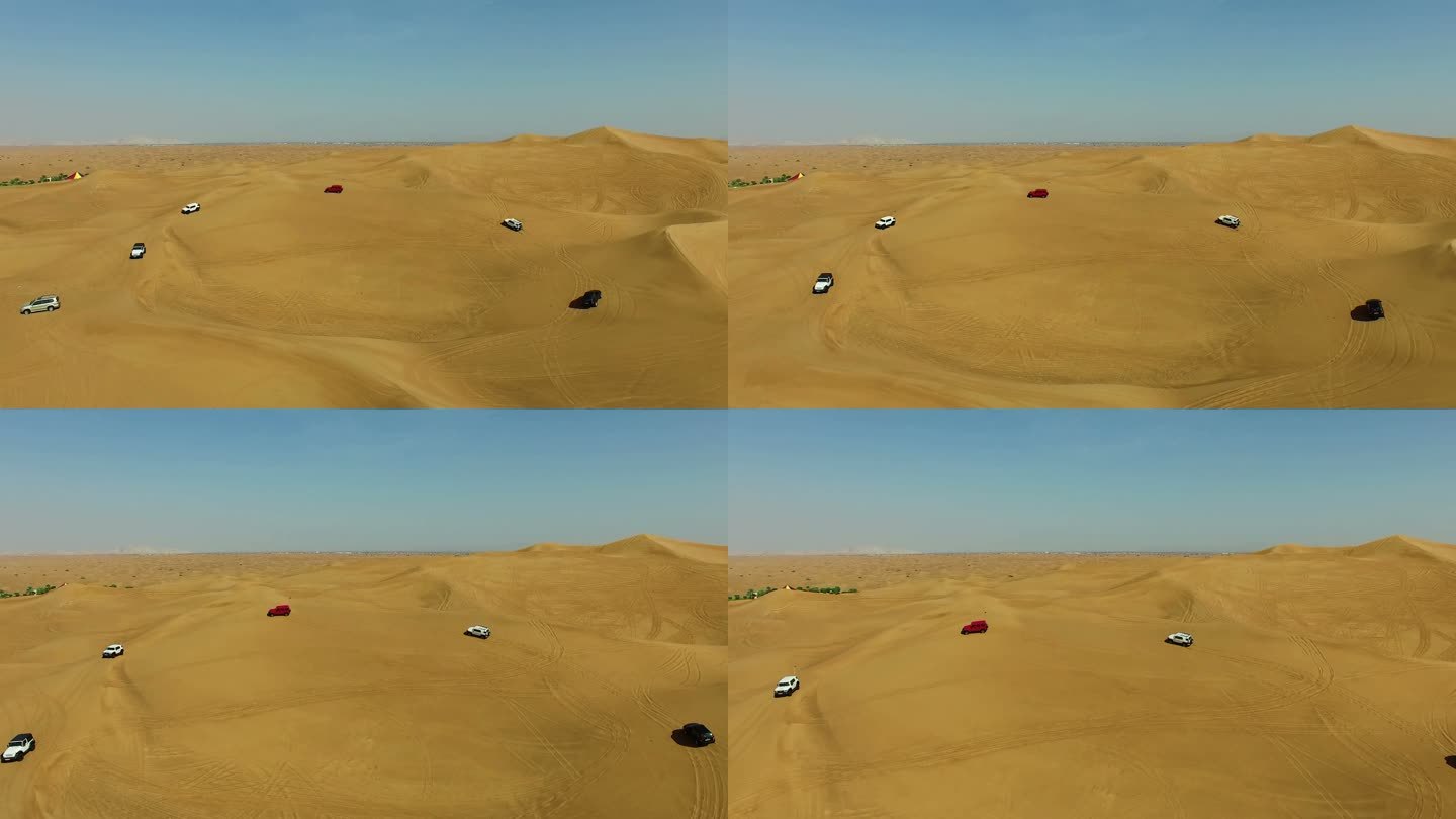阿拉伯沙漠深处4x4越野车沙丘撞击的空中无人机美景