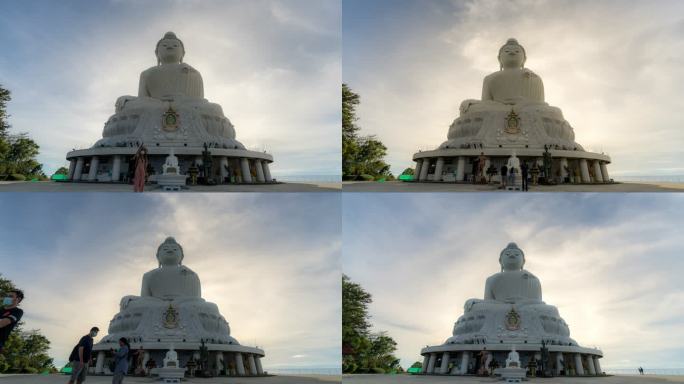 时间流逝在泰国普吉岛上的普吉岛大佛纪念碑上欣赏壮观的日落。钢筋混凝土结构装饰着来自缅甸的白玉大理石S