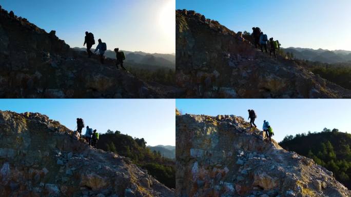 团队协作登山脚步向山顶进发户外探险者爬山