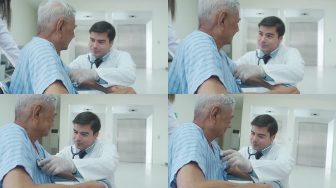 医生手持听诊器检查坐轮椅的亚洲老人患者