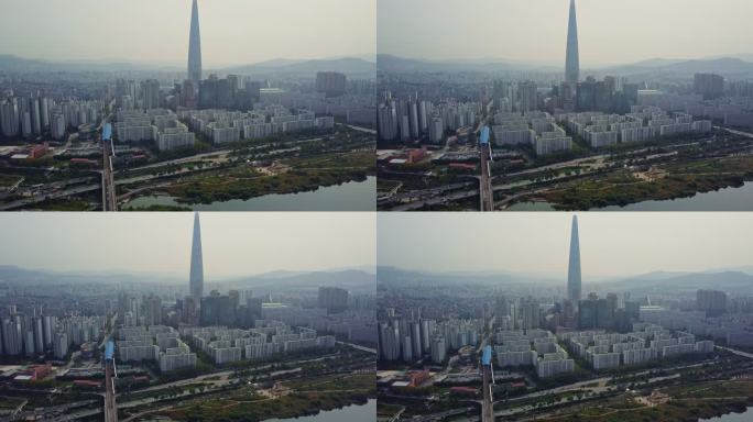 韩国首尔市乐天世界大厦汉江大桥上汽车行驶的鸟瞰图