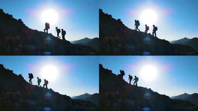 一群人爬山登山剪影团队精神行者攀登高峰