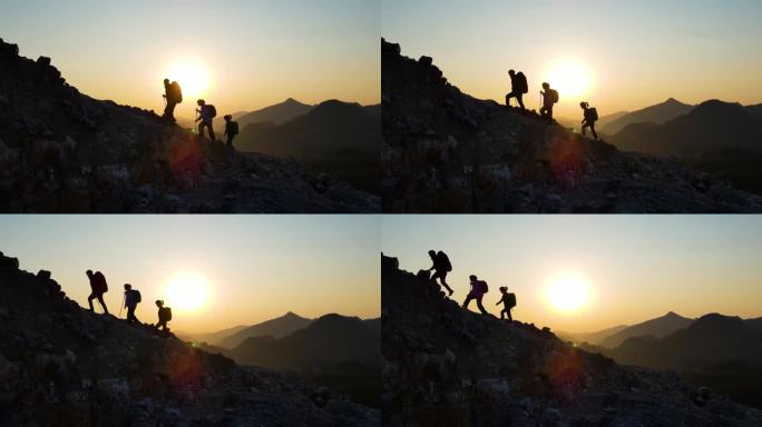一群人成功登顶团队行走登山脚步攀登顶峰