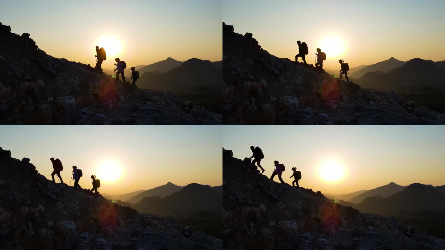 一群人成功登顶团队行走登山脚步攀登顶峰