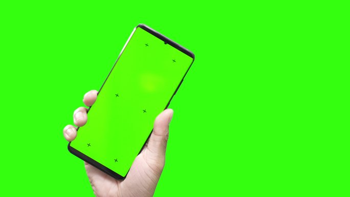 在绿色屏幕上显示显示色度键的智能手机