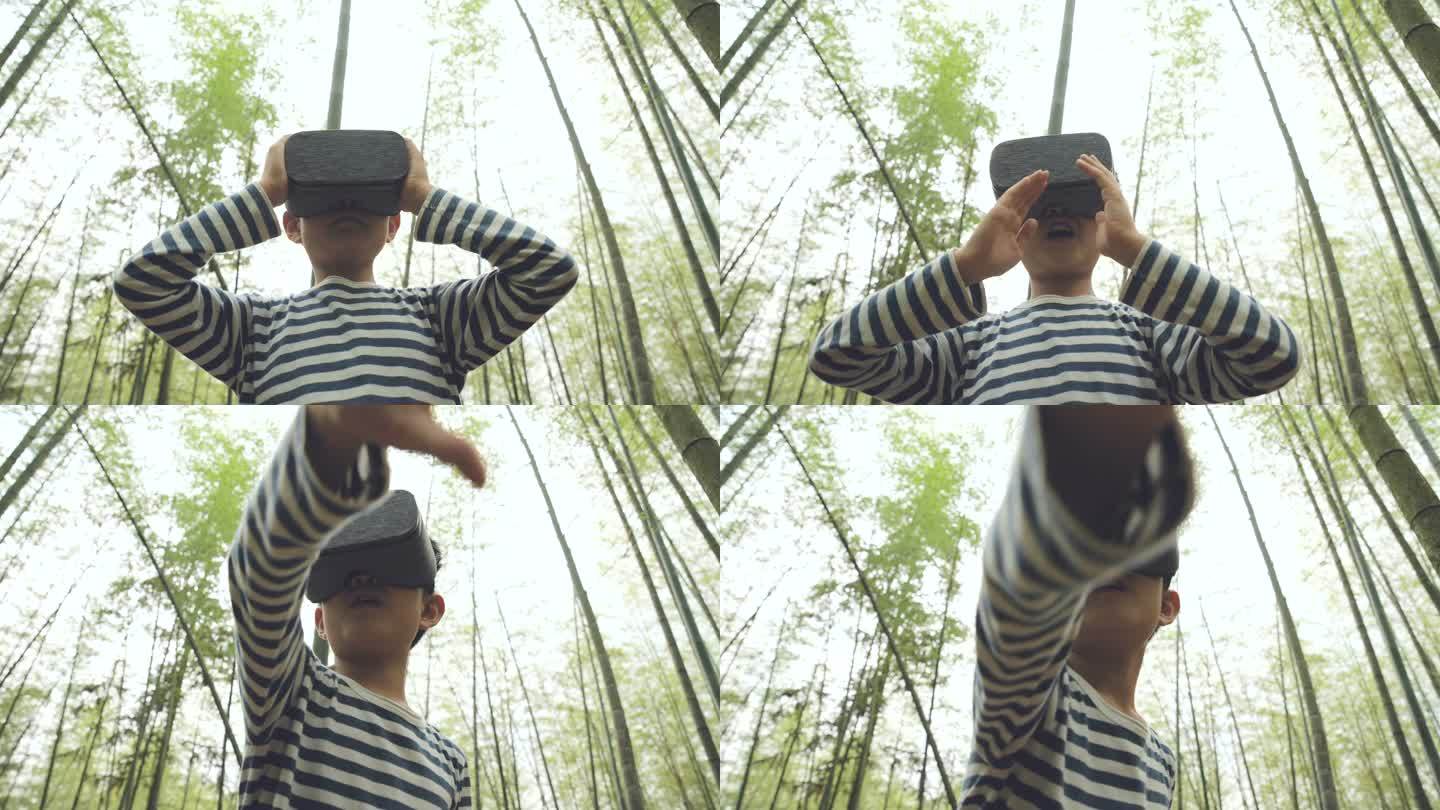小男孩穿着VR设备在竹林里玩耍