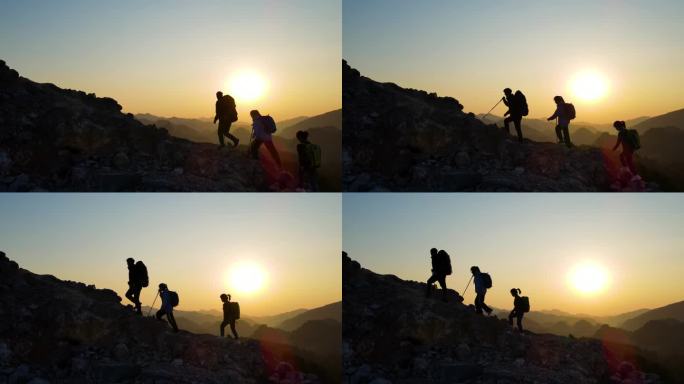 团队登山剪影户外运动徒步旅行攀登顶峰爬山