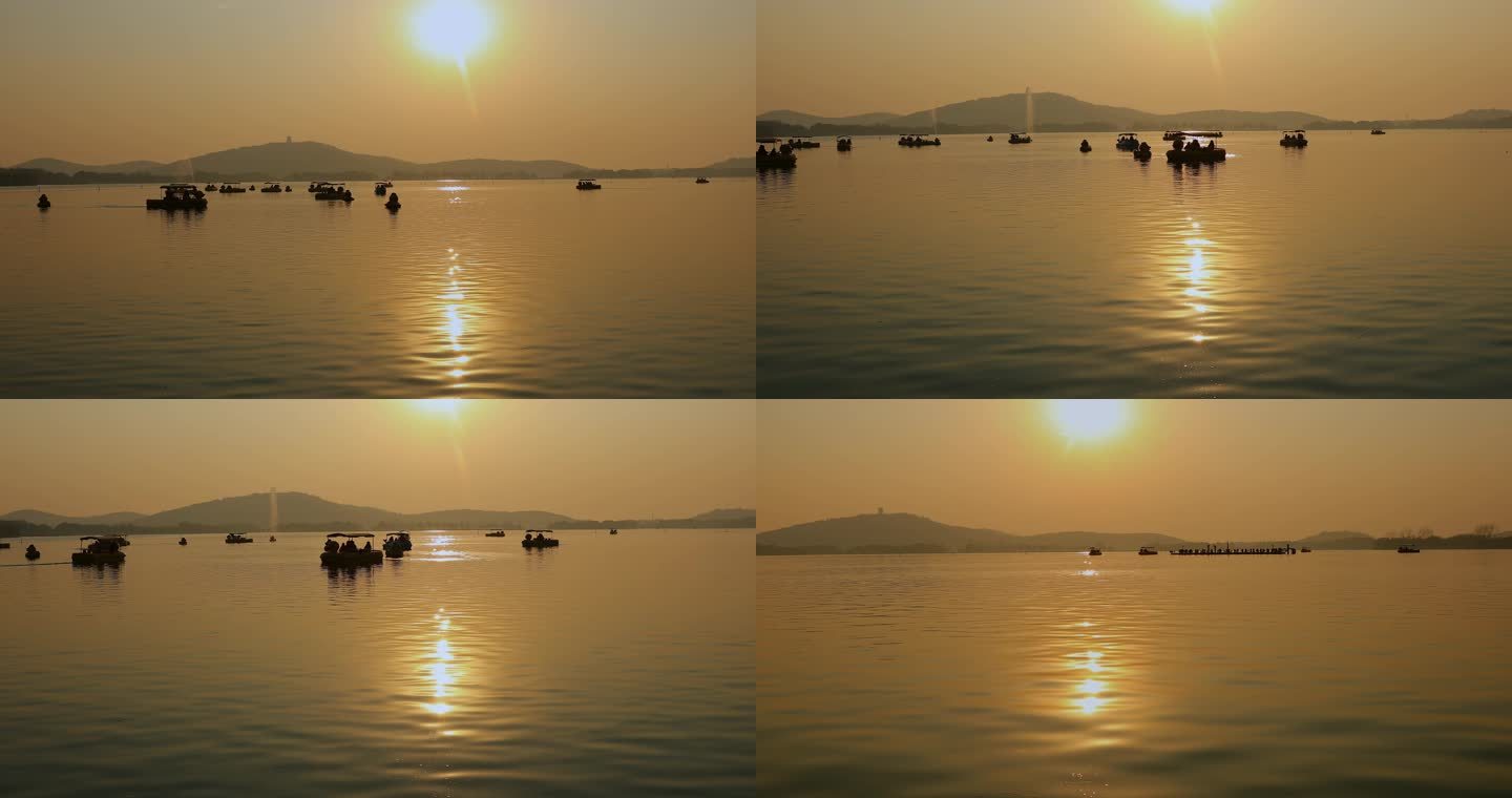 无锡太湖夕阳余晖下划船剪影