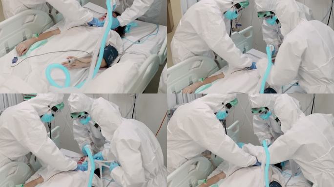 医疗团队在重症监护室为冠状病毒患者连接氧气管的实时视频