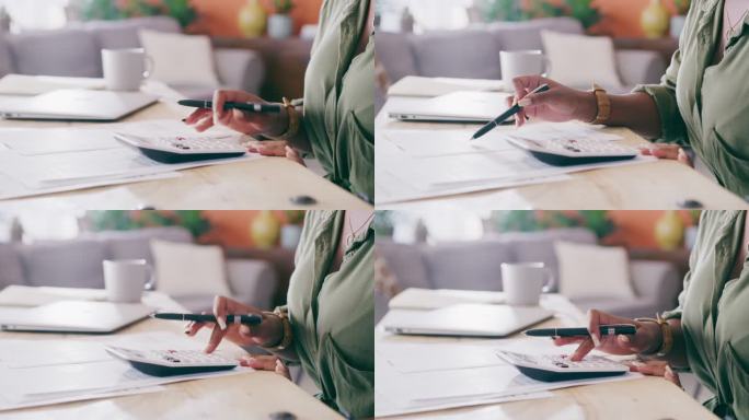4k视频画面显示，一名无法辨认的女性在家中处理文书时使用计算器