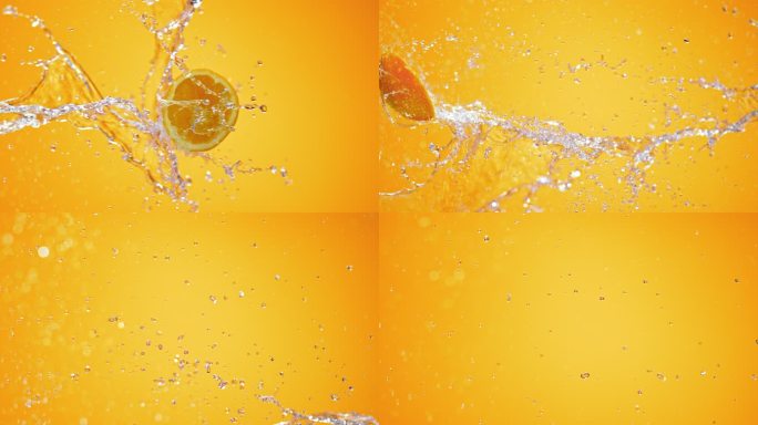 SLO MO一半的橙色被橙色背景上的水射流击中